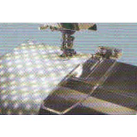 Guide tissu réglable